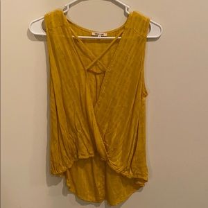 Yellow sleeveless top